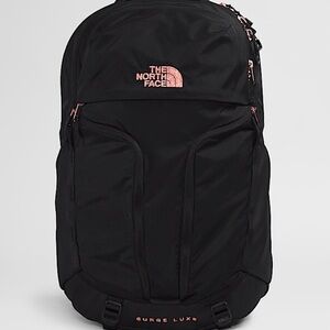 The North Face Black Backpack with Pink Accents
